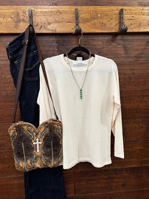 An off-white waffle-knit raglan long-sleeve shirt
