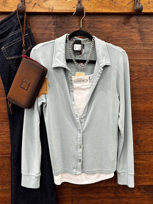 light blue long-sleeve button-up shirt.