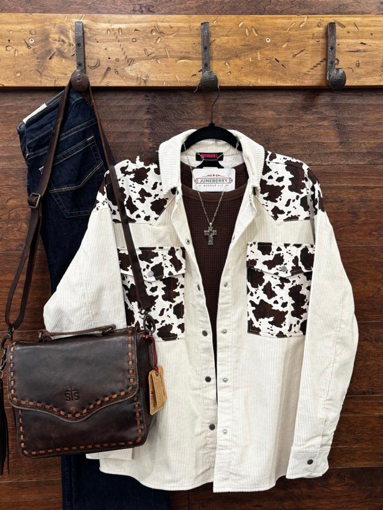Corduroy shirt jacket with cowprint.