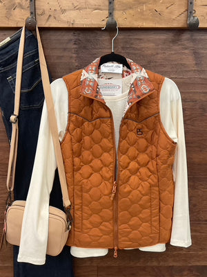 Reversible vest, featuring a striking Aztec print on one side and a solid camel finish on the reverse.