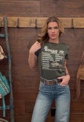 Woman wearing a t-shirt with 'The Rodeo 1998' design