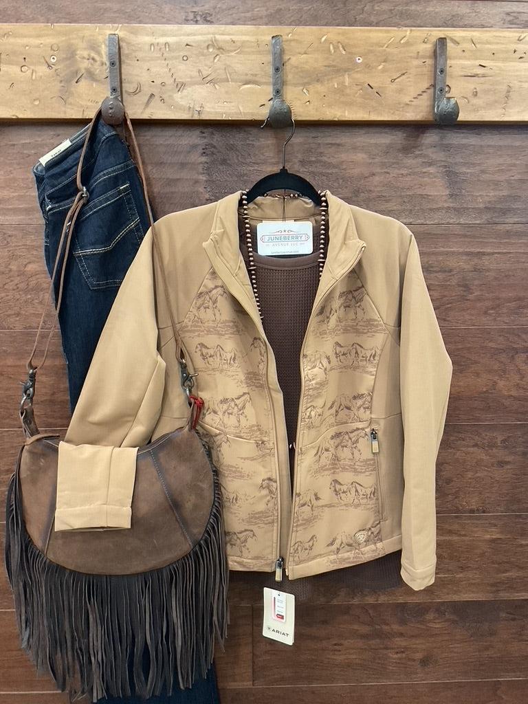 A tan zip-front jacket with a subtle horse-and-rider print.