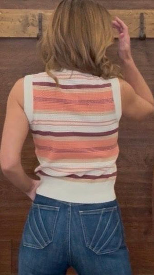 Woman wearing a striped sleeveless top