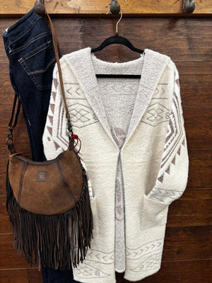 A cream and brown patterned knit cardigan sweater