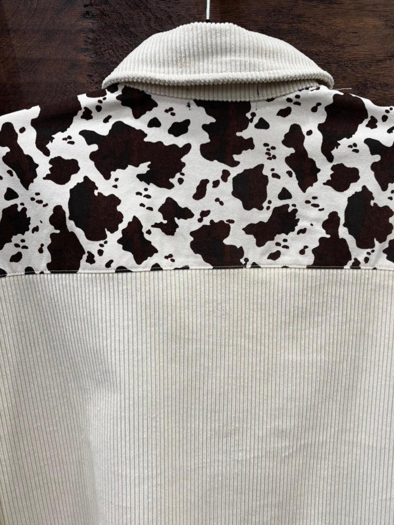 Corduroy shirt jacket with cowprint.