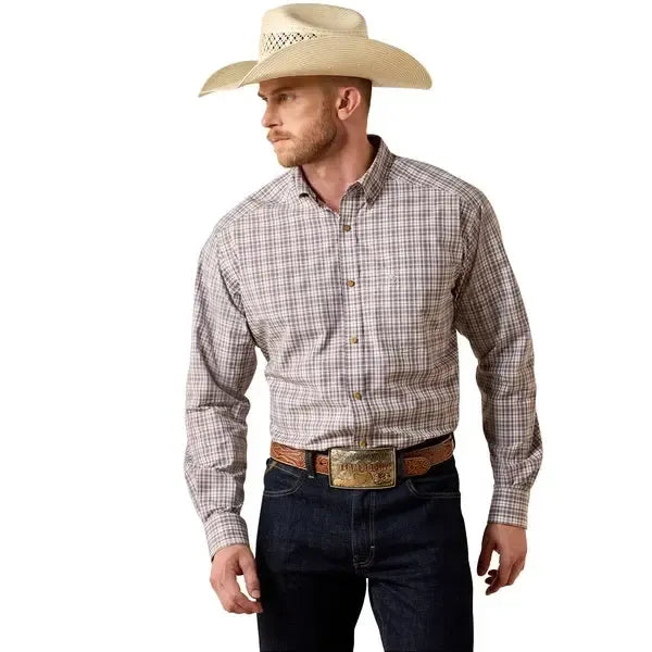Man wearing a plaid shirt, jeans, and a cowboy hat on a white background