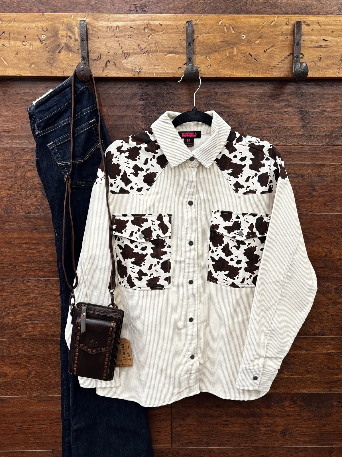 Corduroy shirt jacket with cowprint.