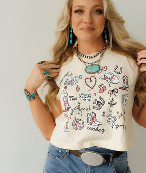 This white t-shirt features eye-catching cowboy graphics, perfect for adding Western flair. The soft fabric makes it ideal for everyday wear, and the bold design ensures you stand out. Pair it with jeans and boots for a complete look.