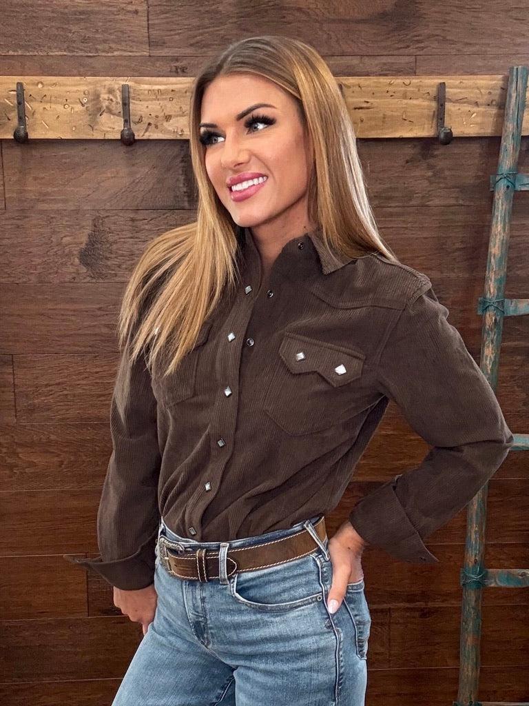 Dark brown western-style button-down shirt with silver studs and chest pockets,