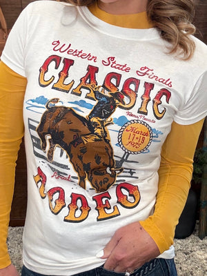 A woman wearing a white graphic t-shirt with a rustic western theme, featuring a brown steer graphic and the words 'Western State Fairs Classic Rodeo',