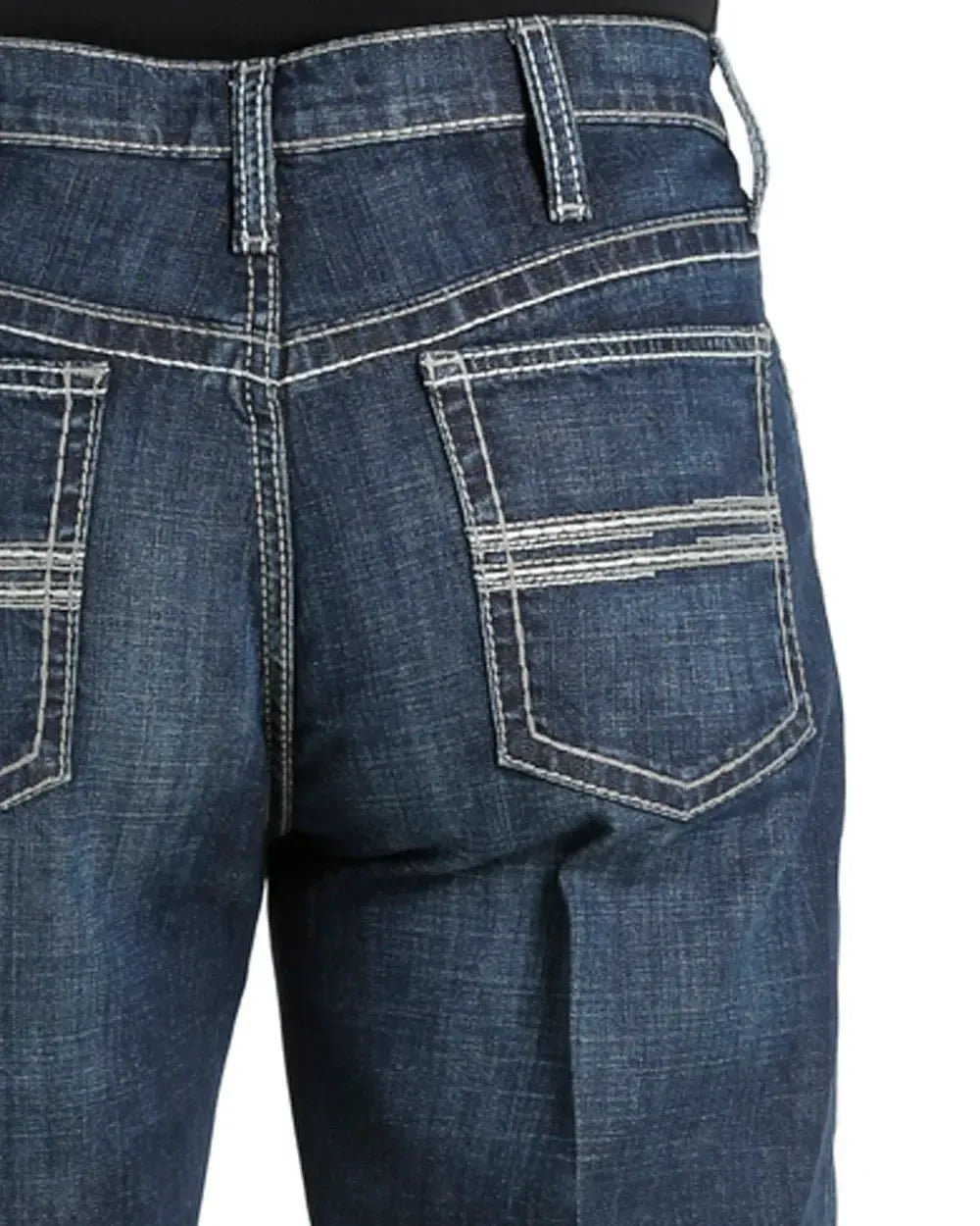 Close-up of blue jeans with a white background