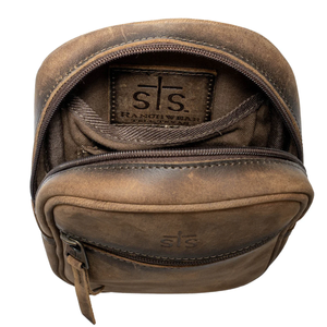 Brown leather pouch with visible 'sts' branding on a white background
