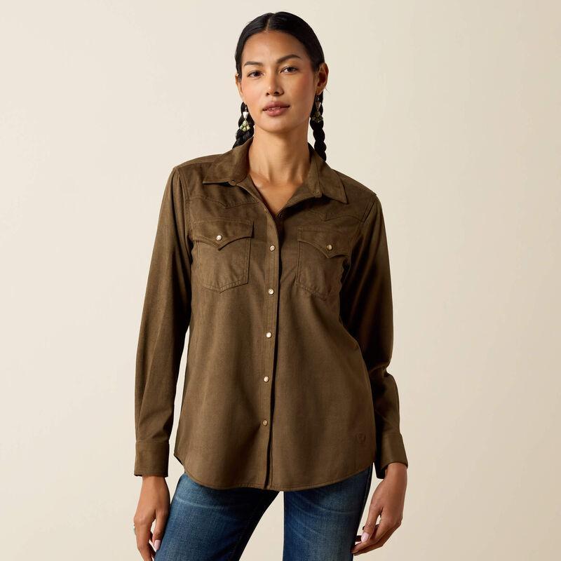 A woman modeling aolive green long-sleeve button-up shirt with two chest pockets.