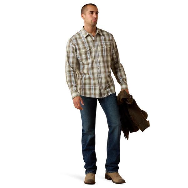 Man wearing a olive green plaid shirt