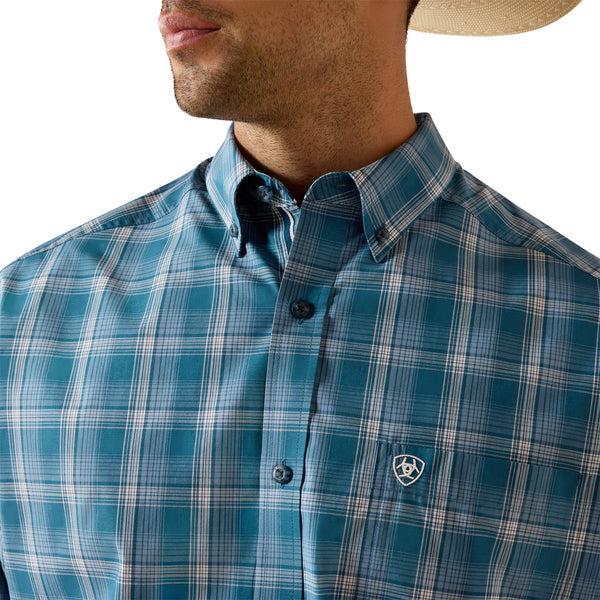 Man wearing a blue plaid shirt