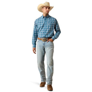 Man wearing a blue plaid shirt