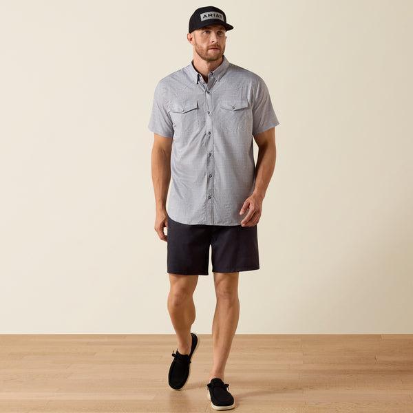 Man wearing grey patterned shirt