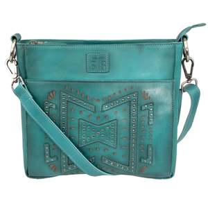 Turquoise handbag with decorative patterns on a white background