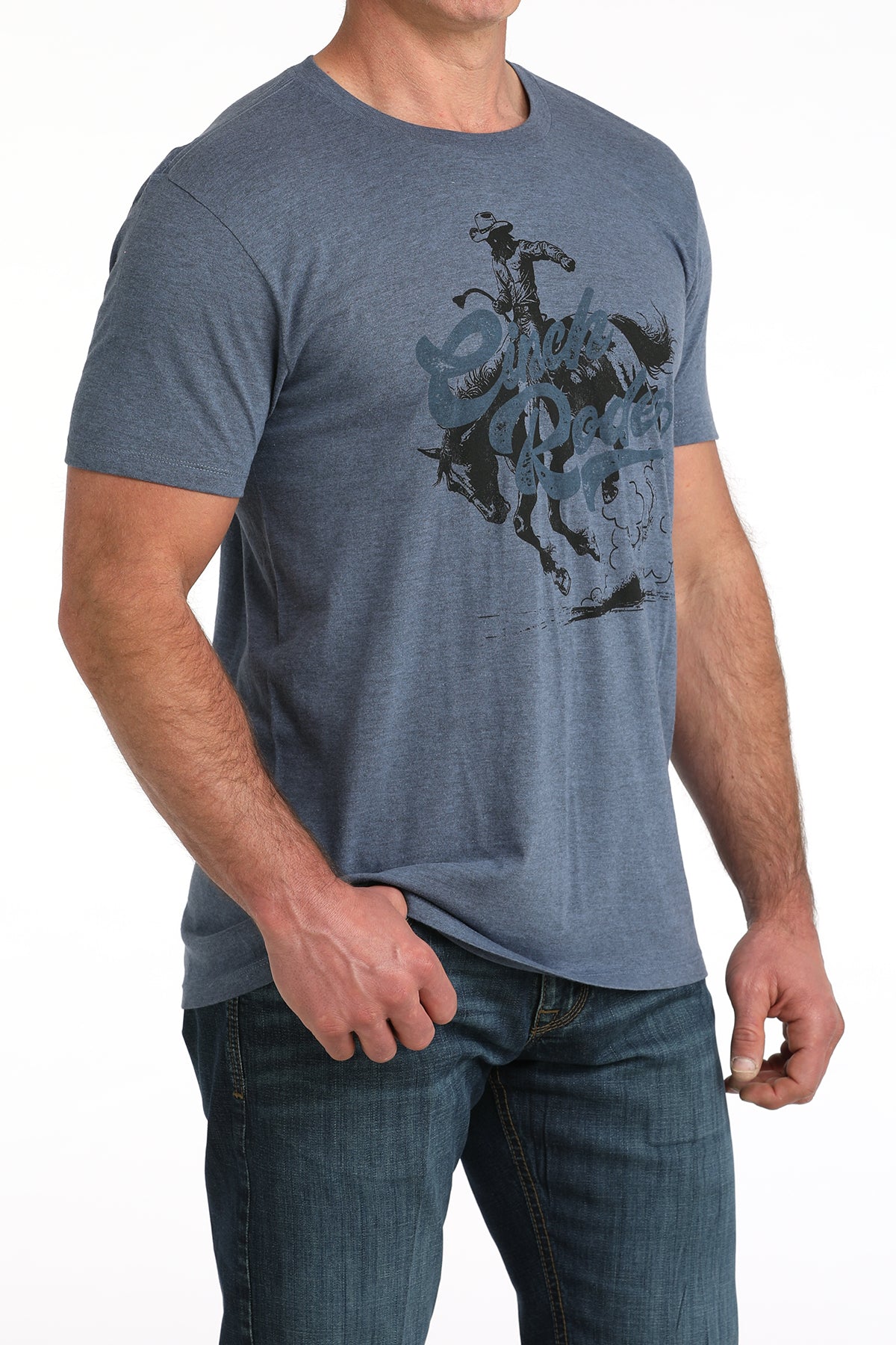 Man wearing a blue t-shirt with a graphic design on a white background