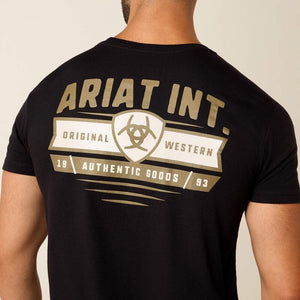 Man wearing a black t-shirt with 'Ariat Int.' logo on the back