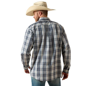 Man wearing a blue plaid shirt.