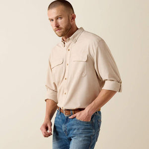 Long sleeve beige btton up shirt.