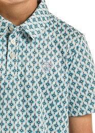 Close-up of a person wearing a patterned shirt with a floral design.