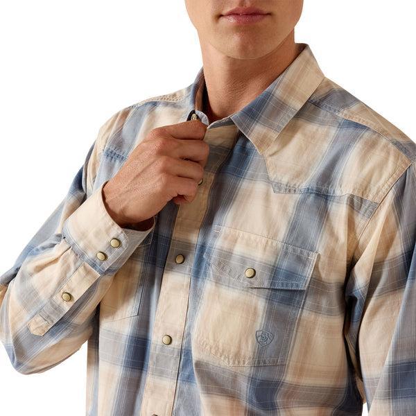 Man wearing a blue plaid shirt