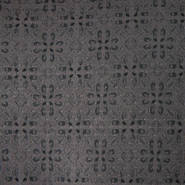 Dark gray fabric with a subtle pattern