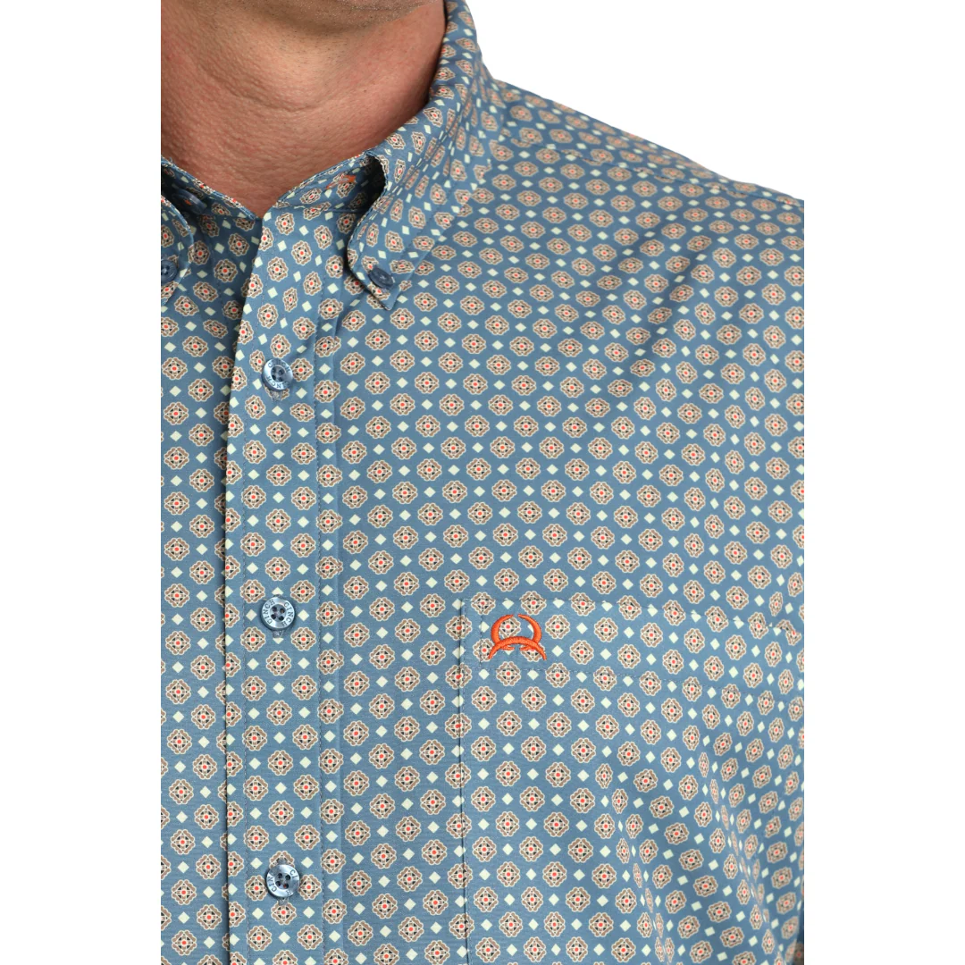 Patterned shirt with a visible brand logo on a white background