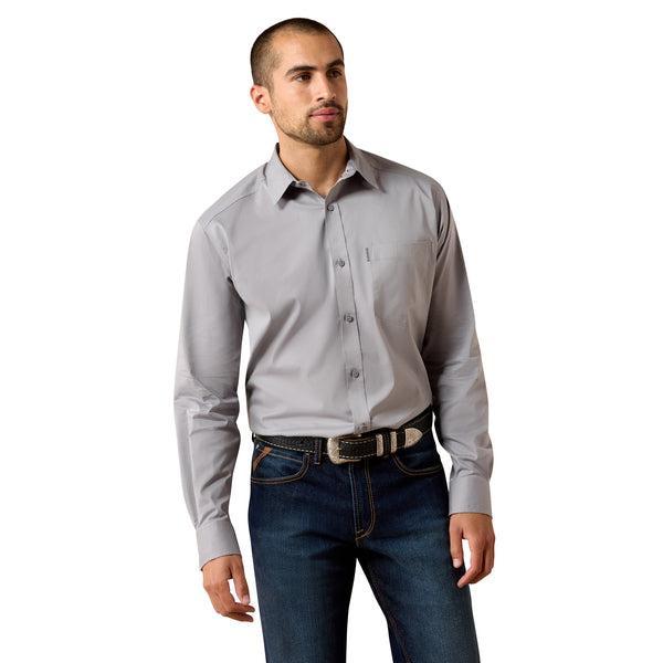 Man wearing a gray dress shirt