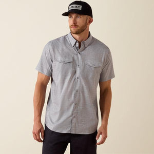 Man wearing grey patterned shirt