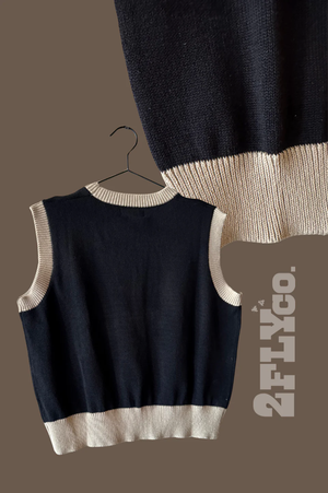 Cozy sweater vest with a charming retro horse graphic. Its soft, neutral palette makes it versatile for layering.