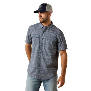 Man wearing a Navy patterned short-sleeve shirt