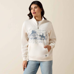 Cream-colored pullover with a graphic design