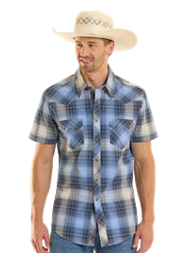 Man wearing a blue plaid shirt and cowboy hat on a white background