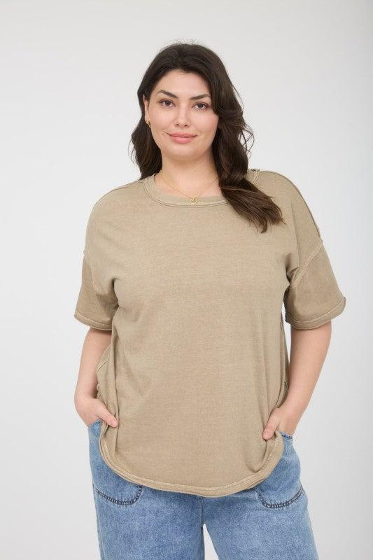 Woman wearing a beige t-shirt
