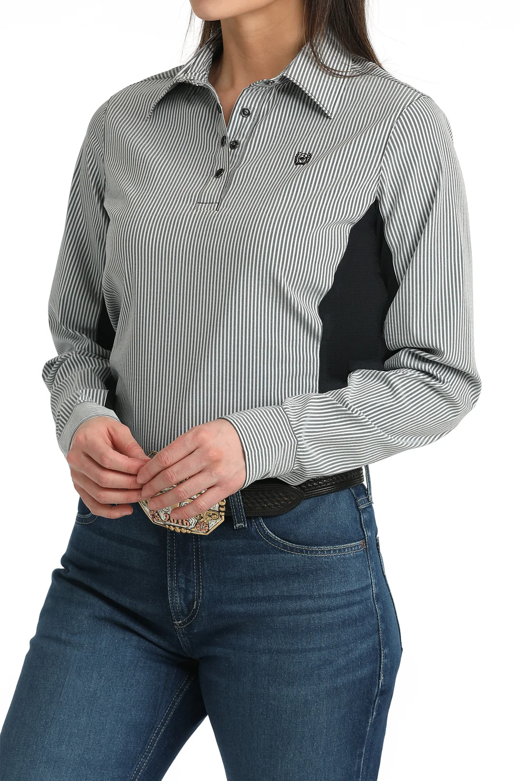 Woman wearing a gray and black striped shirt with a black patch on a white background
