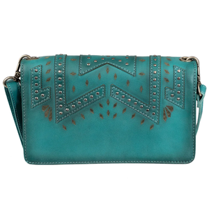 Turquoise handbag with decorative patterns and studs on a white background