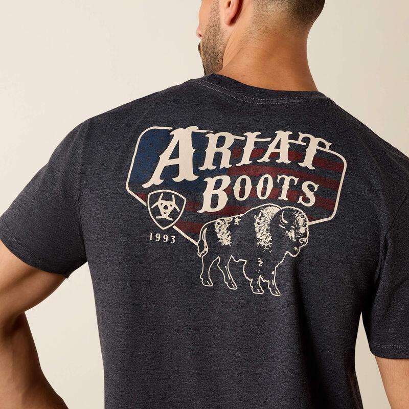 Man wearing a black t-shirt with 'Ariat Boots' logo on the back