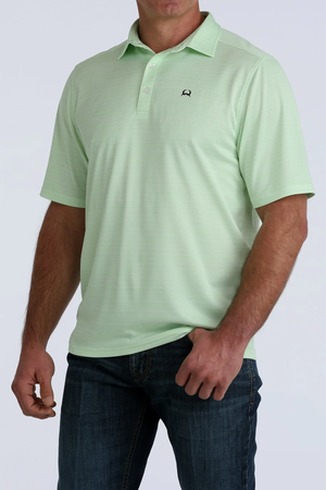 Light green polo shirt worn by a person on a white background