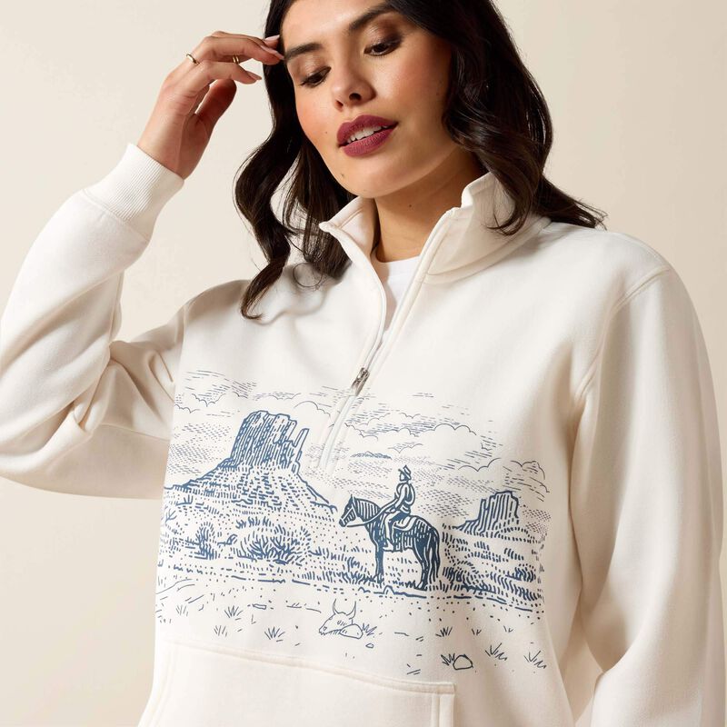 Cream-colored pullover with a graphic design