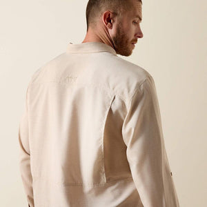 Long sleeve beige btton up shirt.