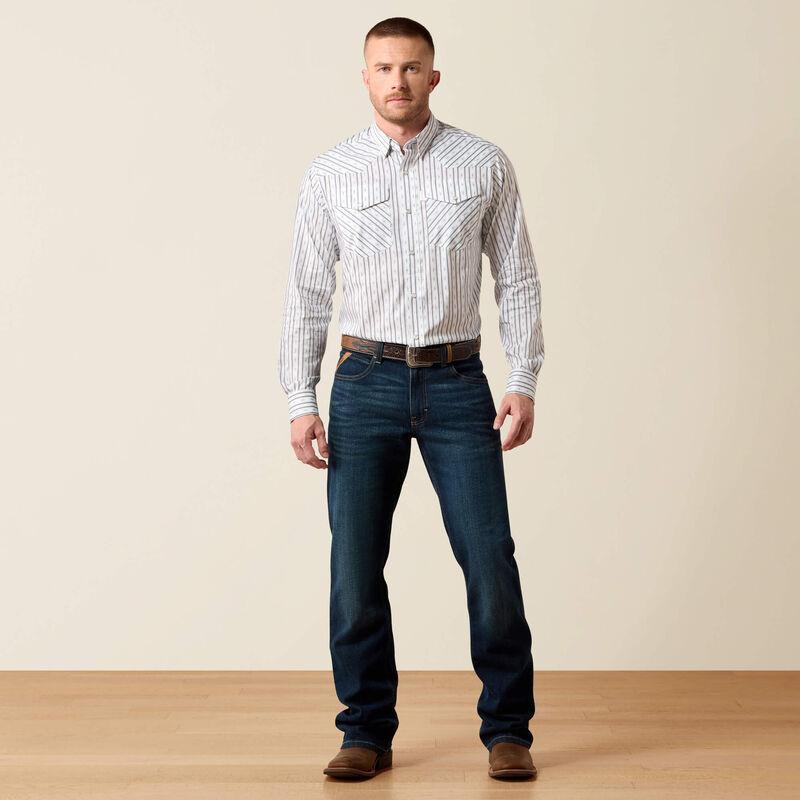A man wearing a long-sleeve western-style button-down shirt with thin vertical blue and white stripes