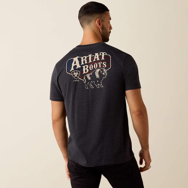 Man wearing a black t-shirt with 'Ariat Boots' logo on the back