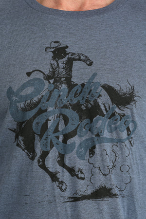 BLUE t-shirt with a graphic of a cowboy riding a horse and the text 'Cowboy Rides'.