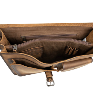 Brown leather bag with open compartments on a white background