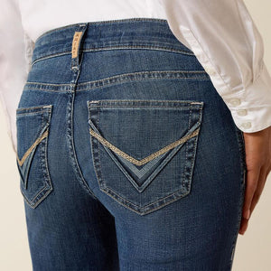 This trouser features intricate 3D pocket detailing and a comfortable figure-flattering rise