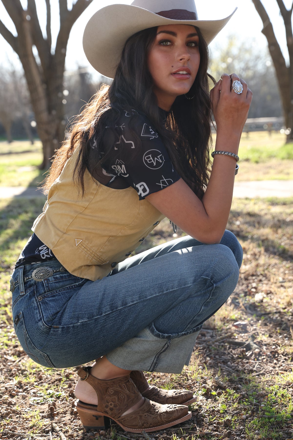 Woman wearing a gold vest