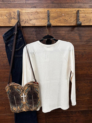 An off-white waffle-knit raglan long-sleeve shirt 